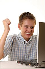 Nuance - Young Boy Spending Time With Notebook Nuance - Young Boy Spending Time With Notebook